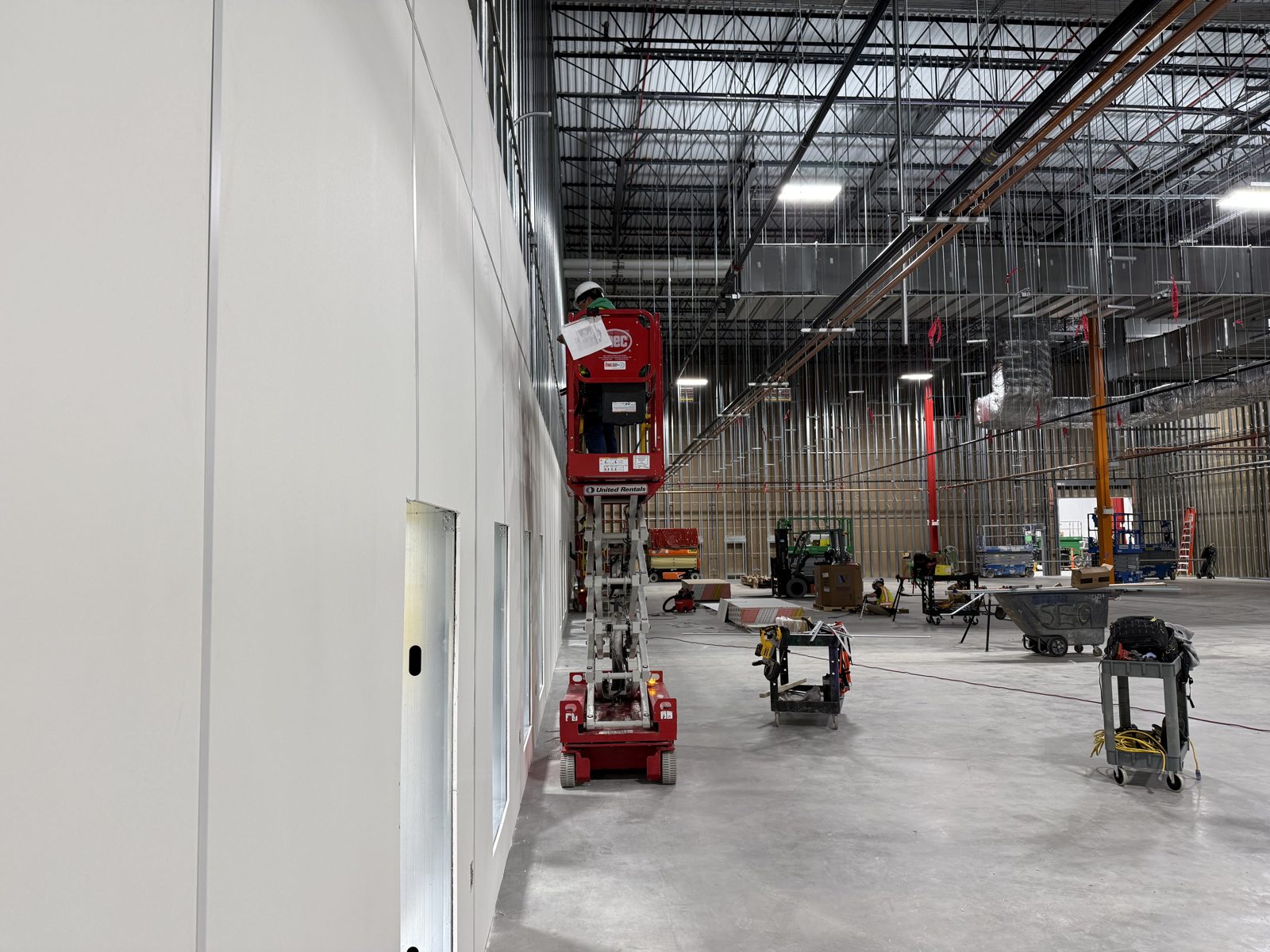 LVM Drywall commercial project — finished drywall in a warehouse